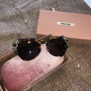 Miu Miu rhinestone glasses